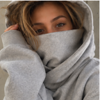 Large hoodie covers lower face