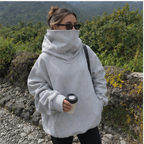 Large hoodie covers lower face